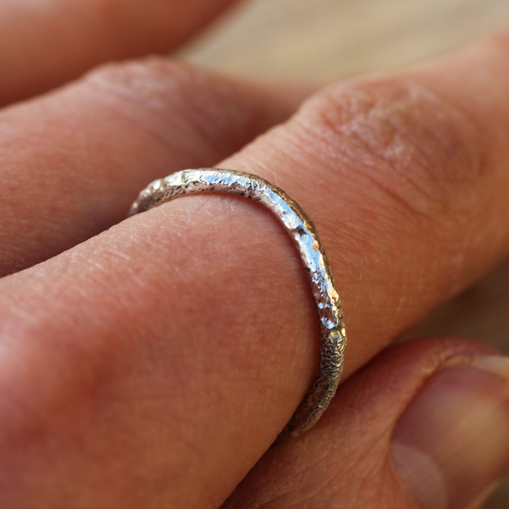 Sterling silver stacking rings inspired by the sea and handmade in 100% recycled metals