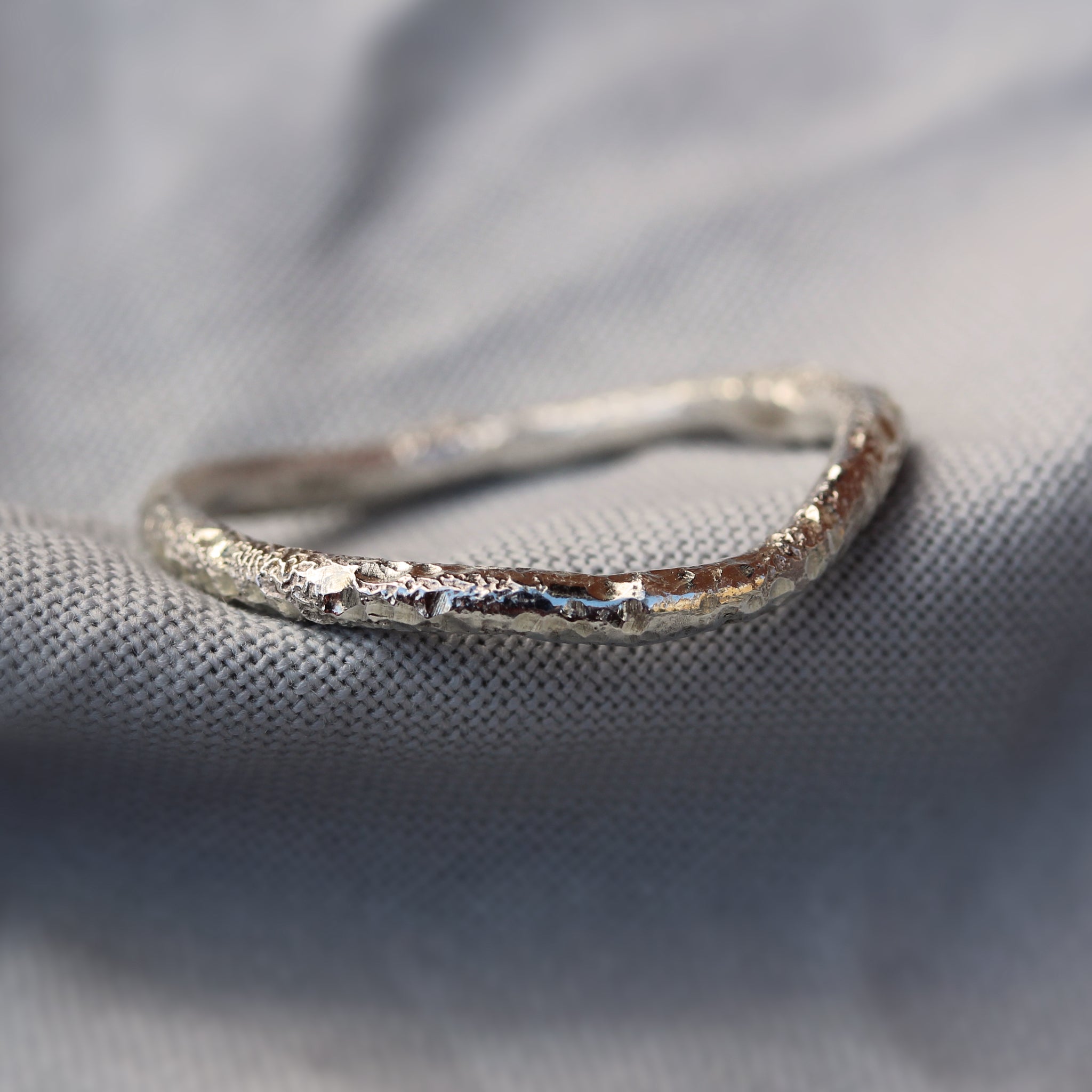 Sterling silver stacking rings inspired by the sea and handmade in 100% recycled metals