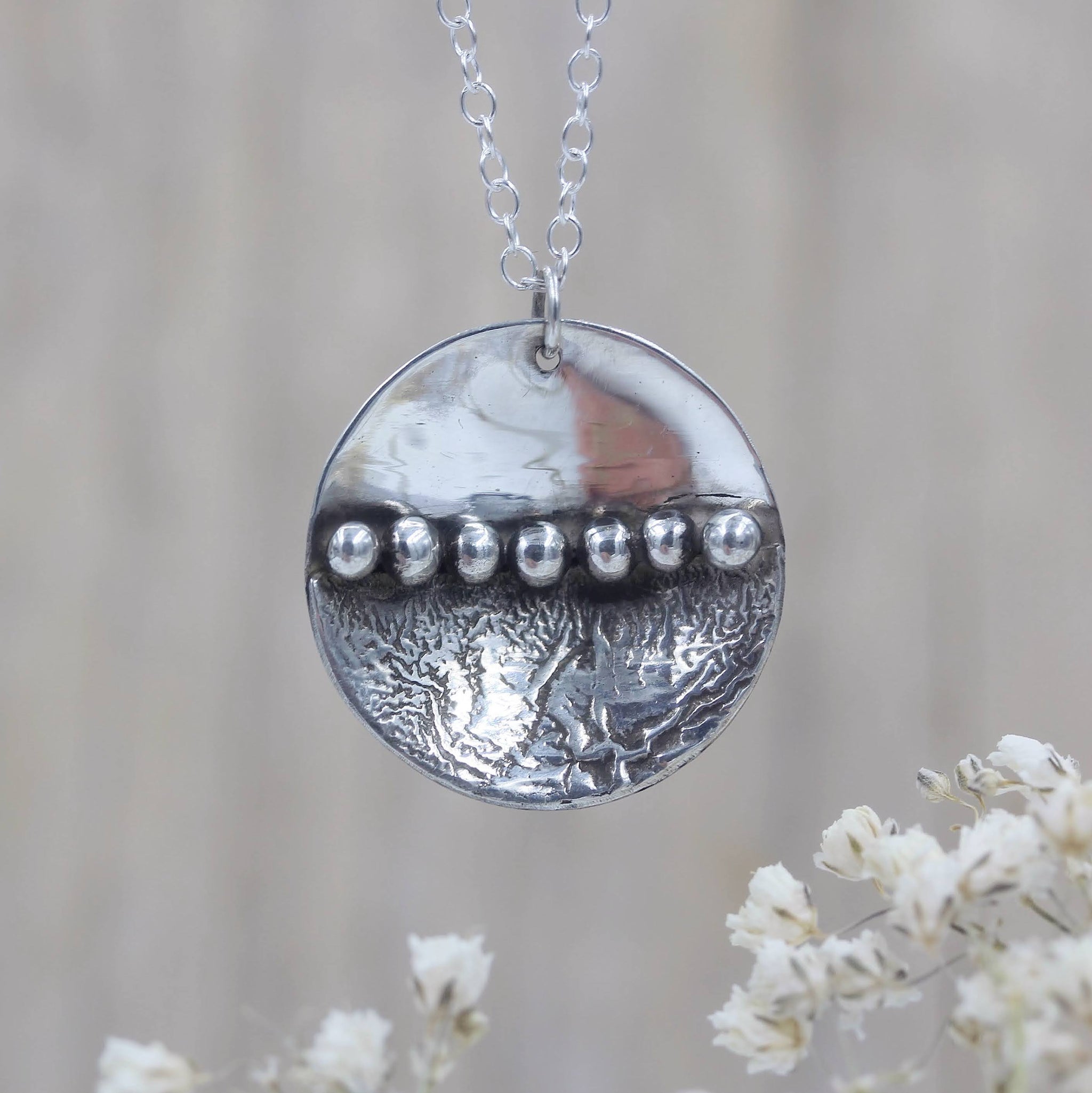 circle shoreline inspired pendant, handmade in sterling silver by Gemma Tremayne Jewellery
