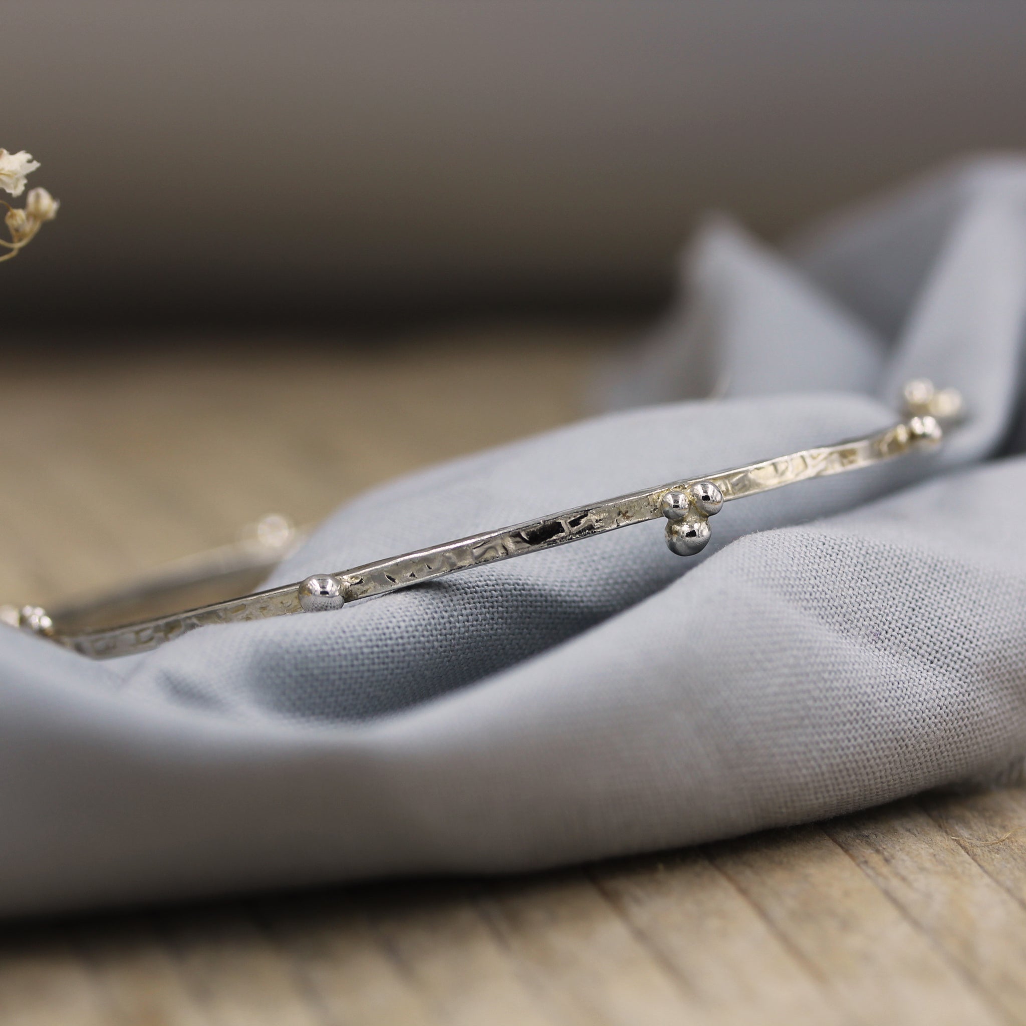 Sea inspired sterling silver bangle, handmade in 100% recycled silver 