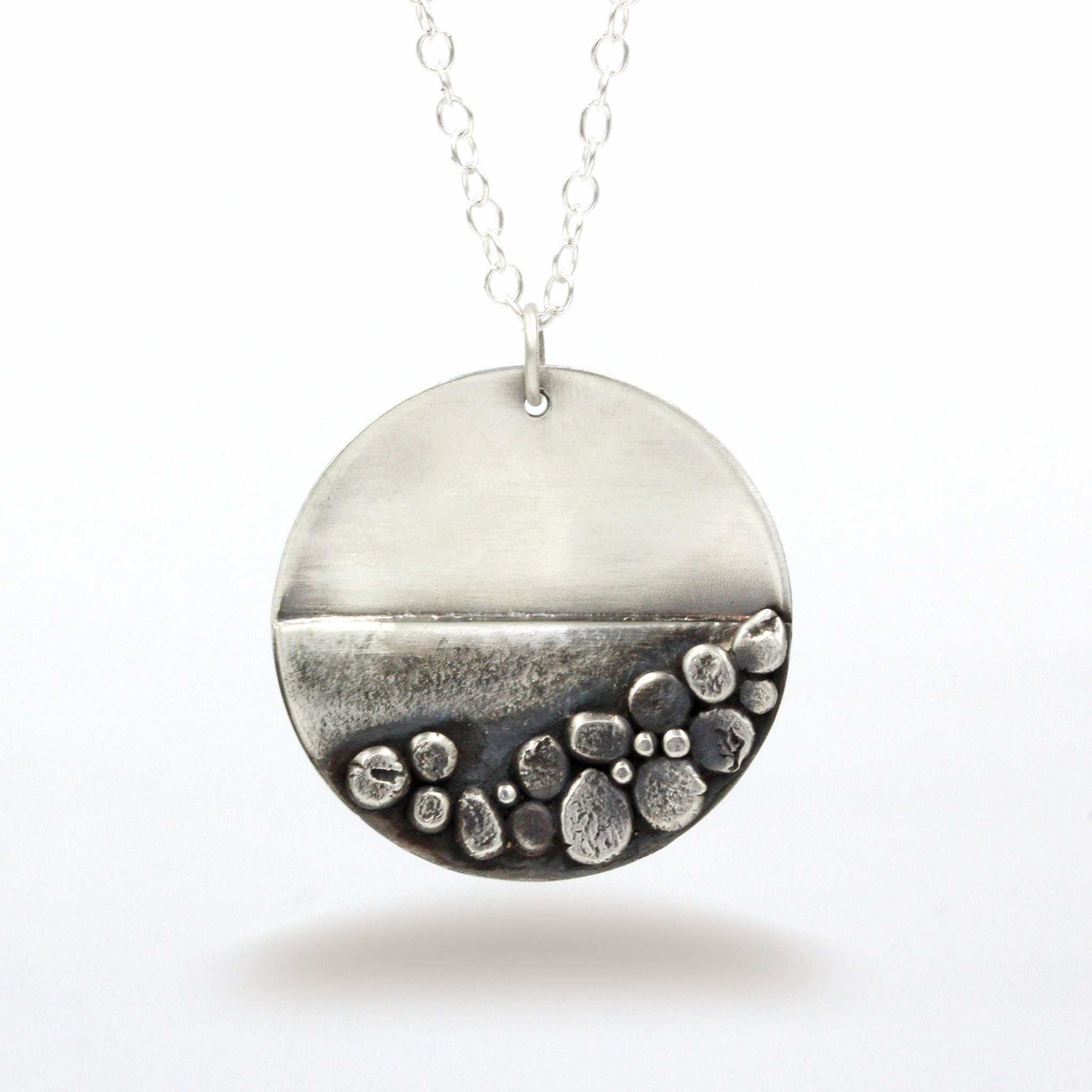 Sterling silver necklace, showing a moonlit beach. Handmade recycled silver necklace.