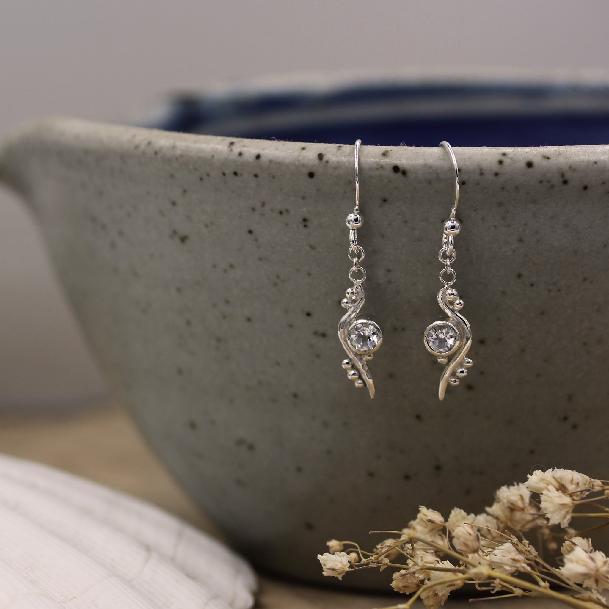 Sea inspired drop earrings handmade in recycled silver and white topaz