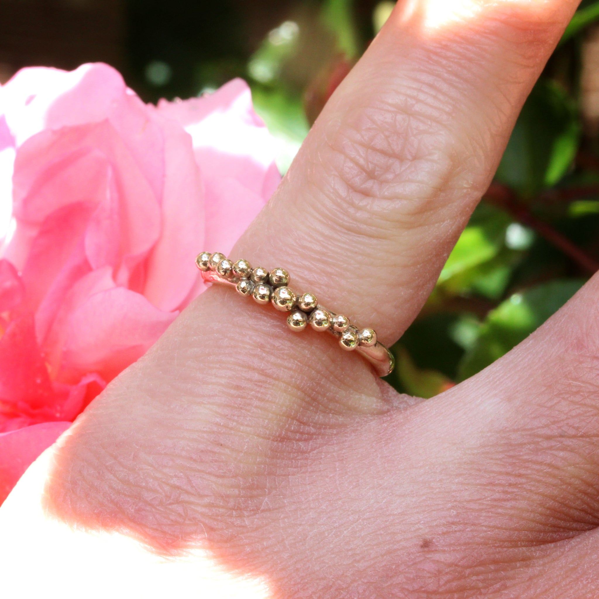 Handmade sea inspired 9ct gold wedding ring 