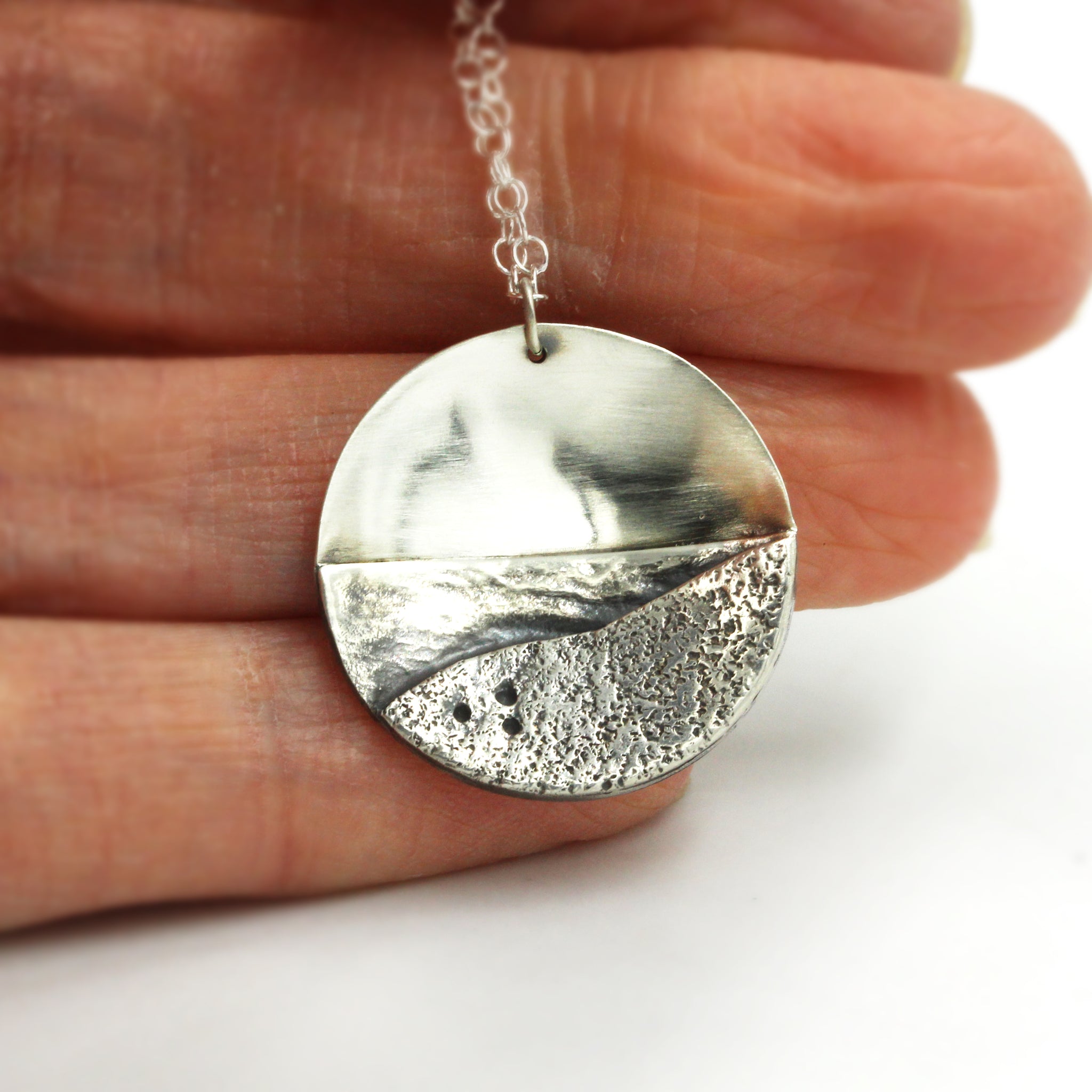 Sterling silver necklace, showing a moonlit beach. Handnmade recycled silver necklace.