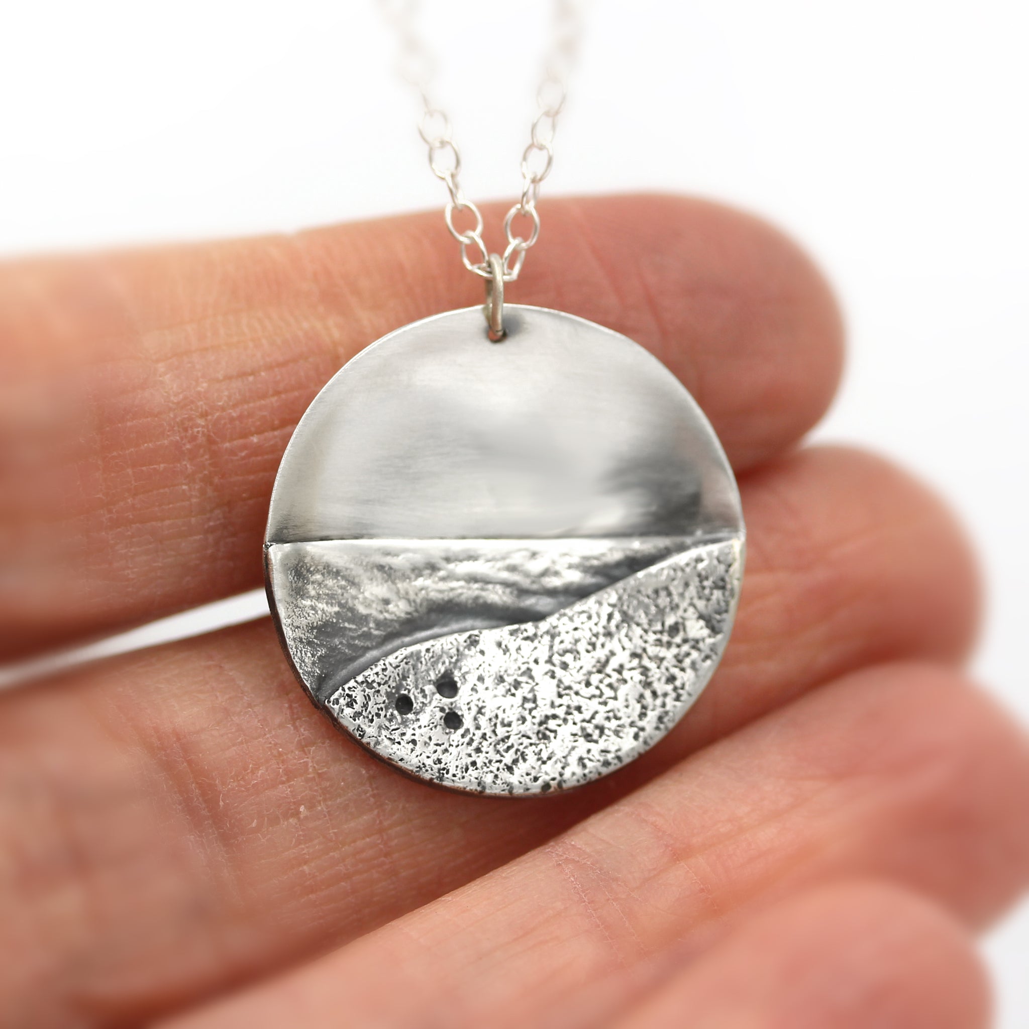 Sterling silver necklace, showing a moonlit beach. Handnmade recycled silver necklace.