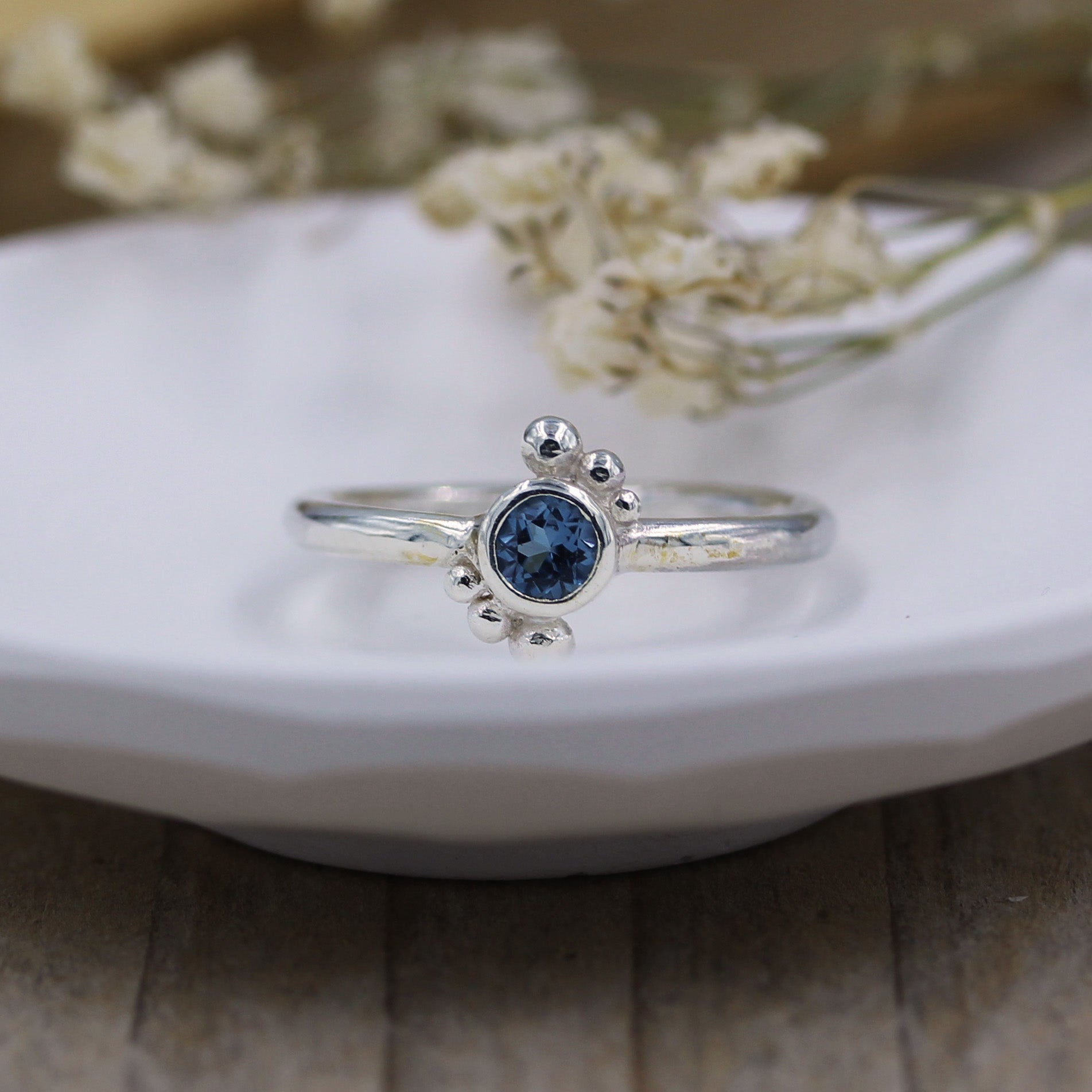Sea inspired ring, handmade with 100% recycled silver and London Blue Topaz