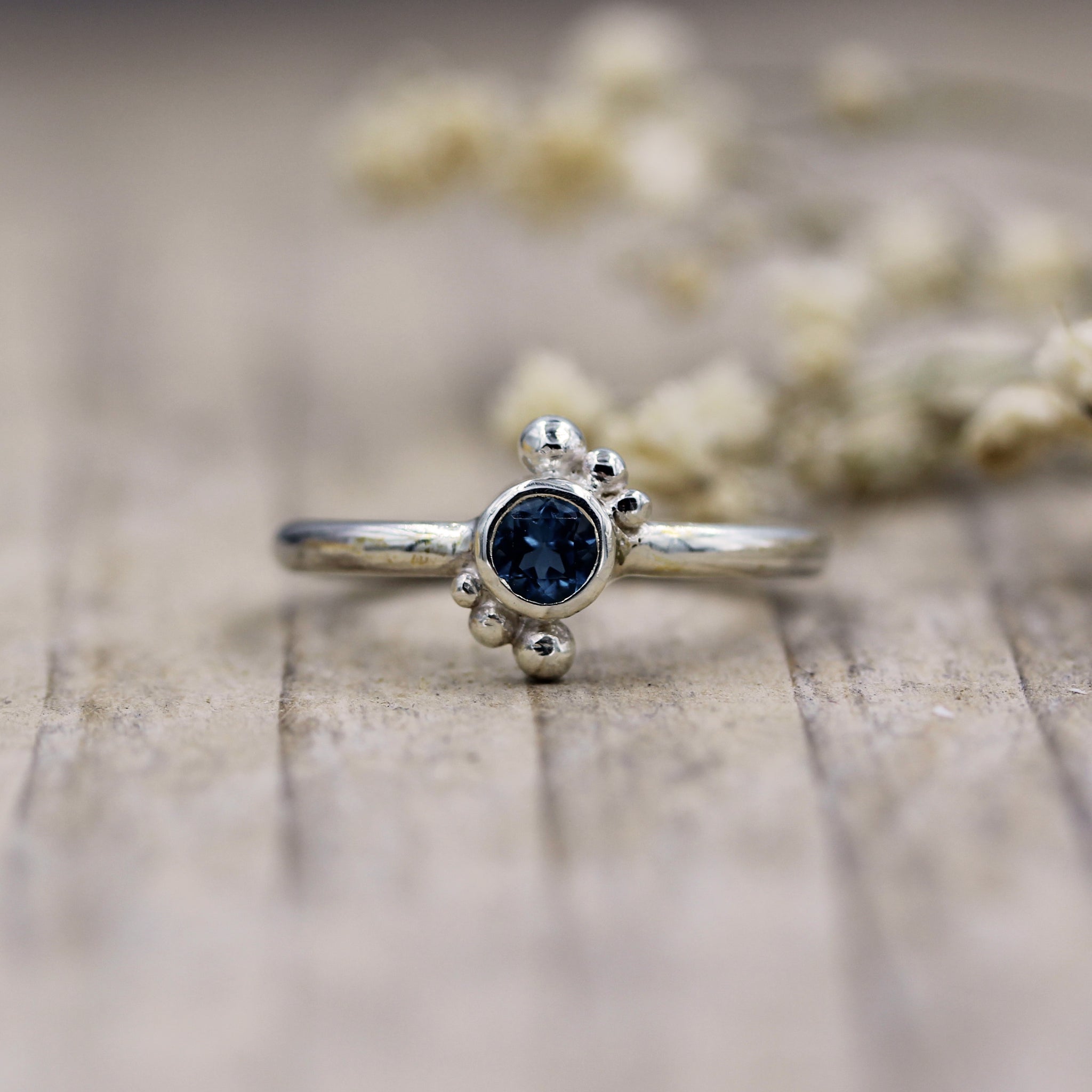 Sea inspired ring, handmade with 100% recycled silver and London Blue Topaz