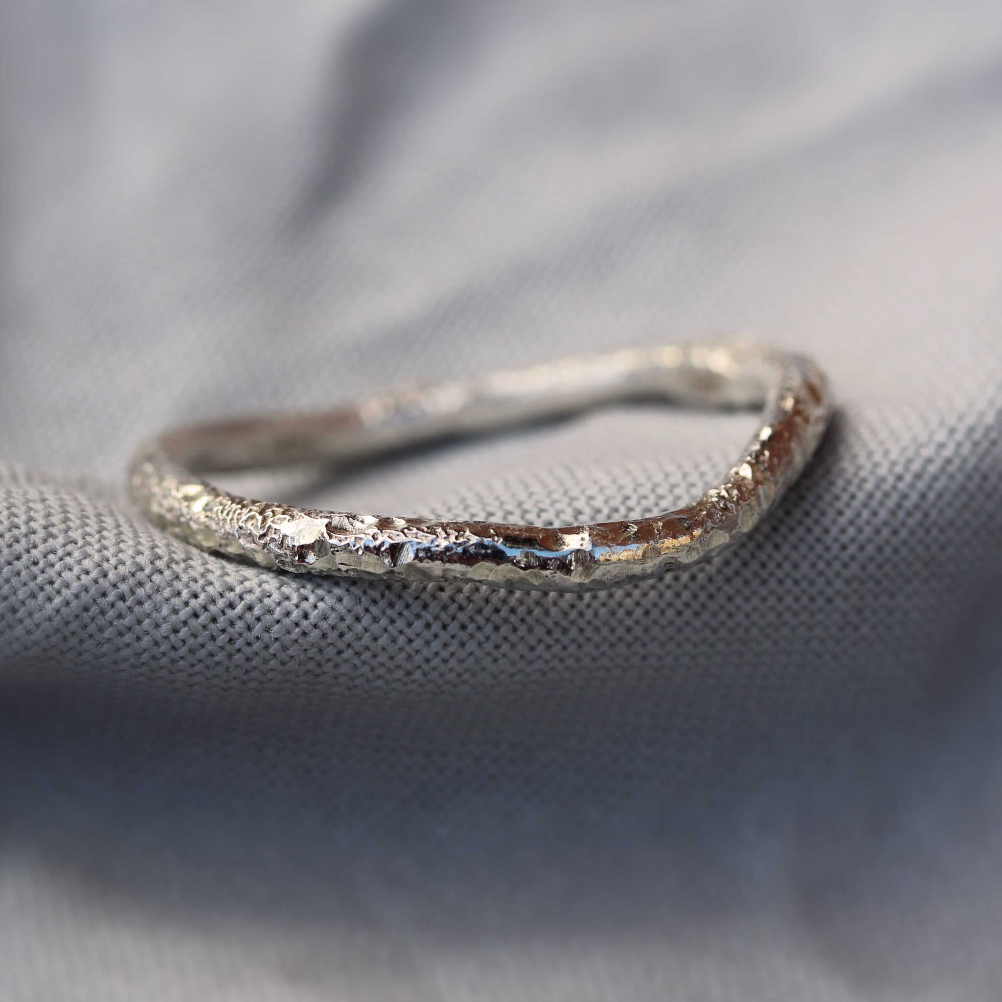 Sterling silver stacking rings inspired by the sea and handmade in 100% recycled metals 